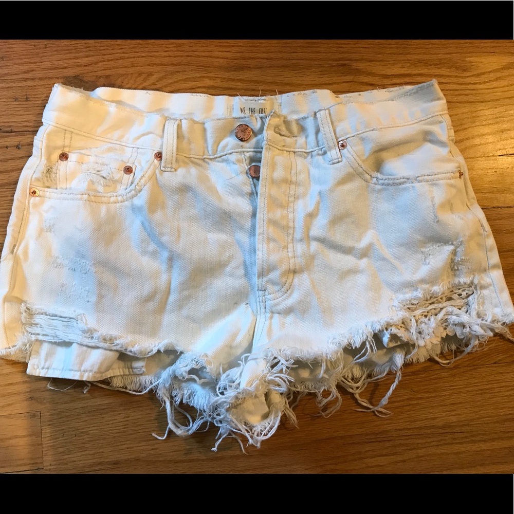 Free people distressed white shorts